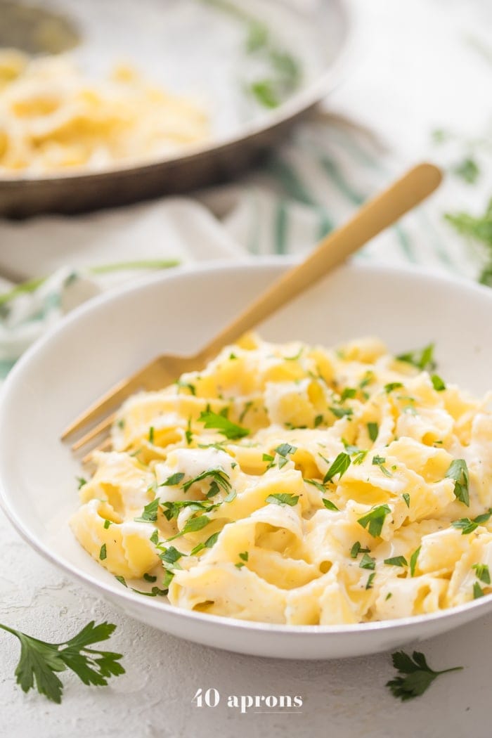 Cottage cheese alfredo with fettuccine noodles in a bowl