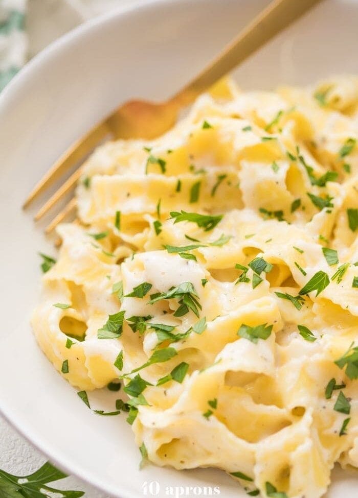 Cottage cheese alfredo with fettuccine noodles in a bowl