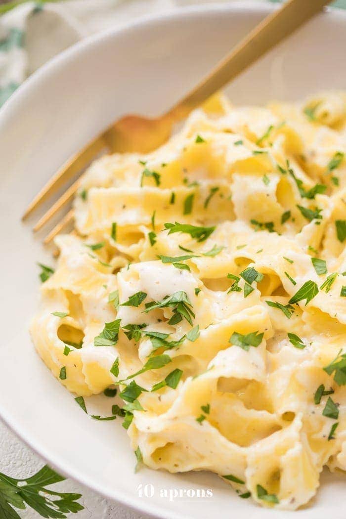 Cottage cheese alfredo with fettuccine noodles in a bowl