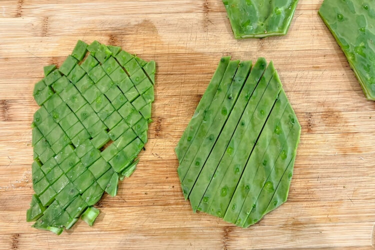 Nopales paddles sliced into strips and cubes.
