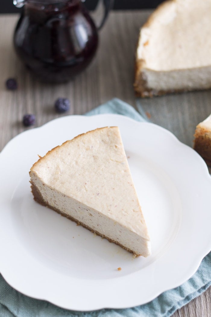 Vegan Lemon Ricotta Cheesecake with Blueberry White Wine Sauce