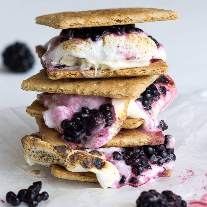Blackberry white chocolate smores are the ultimate summer treat. Ripe blackberries, melty white chocolate, toasted marshmallow, & buttery graham crackers.