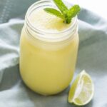 Mango mojito smoothie. Literally, summer in a glass. Creamy, frothy, sweet, fresh.. just perfect.