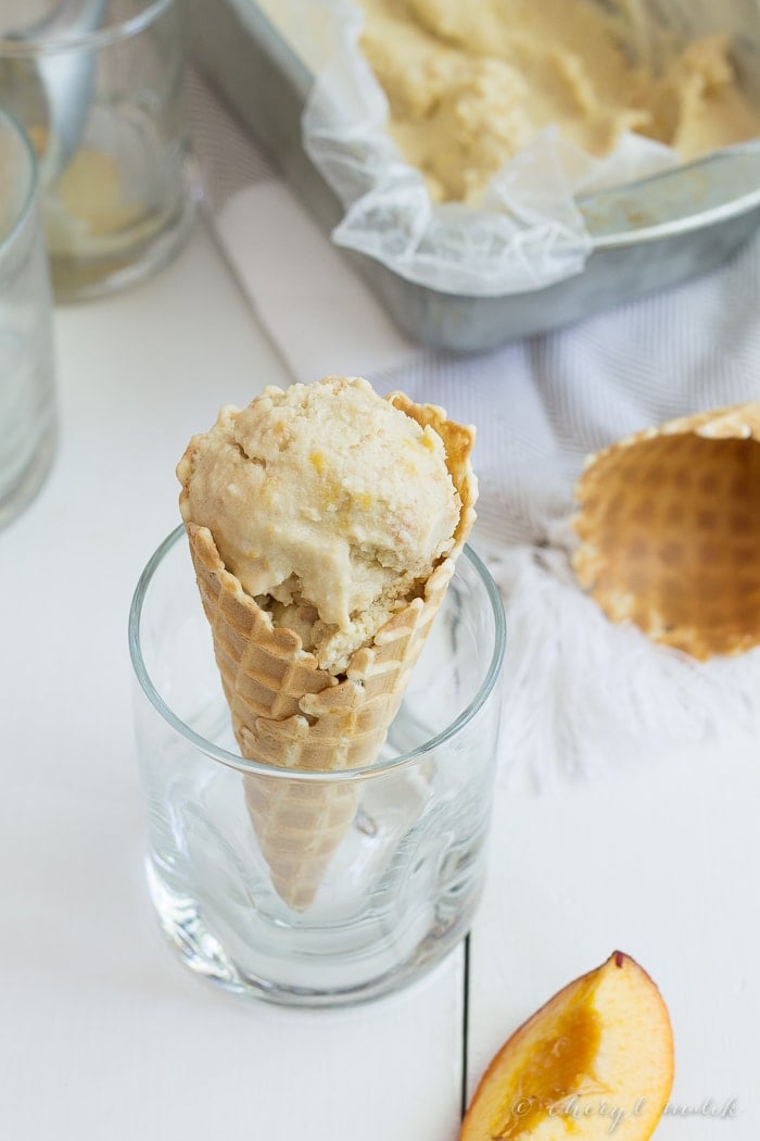 Vegan Peach Ice Cream. 7 ingredients, no refined sugars, no gluten. Just tons of peaches and coconut milk and summery goodness!