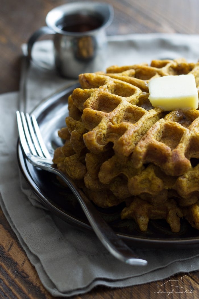 Tender, spiced vegan pumpkin waffles. Perfect for fall mornings