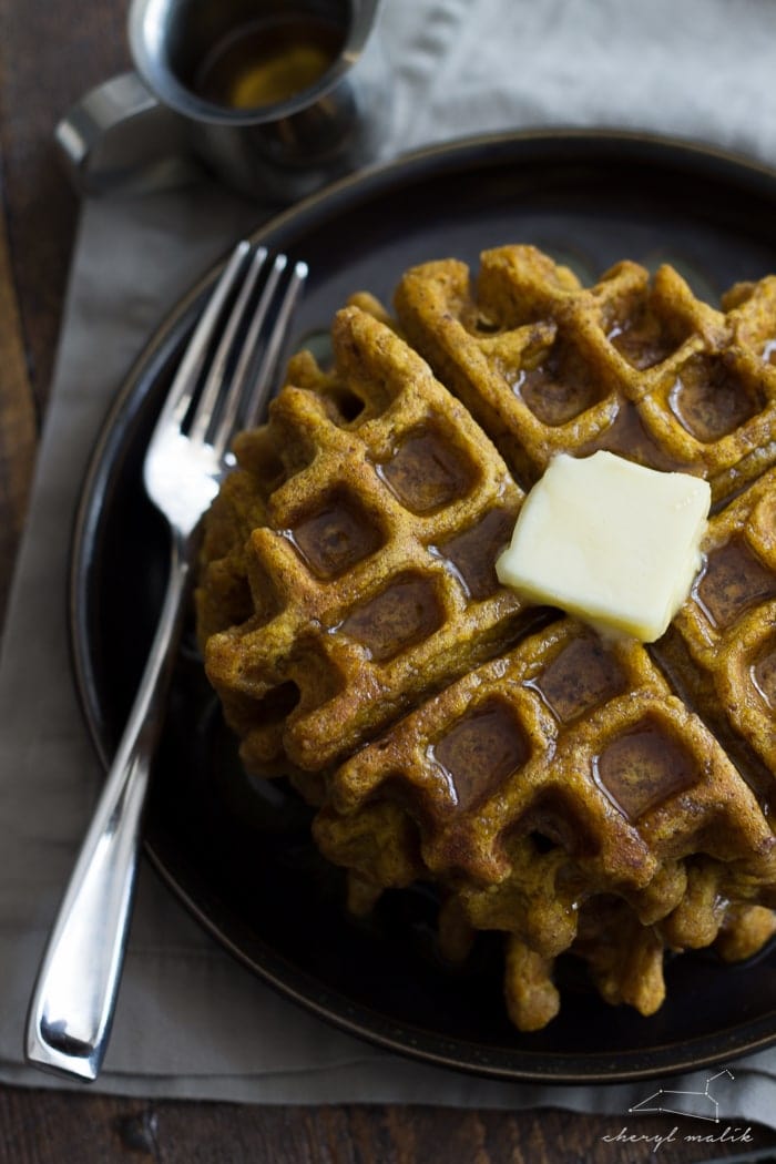 Tender, spiced vegan pumpkin waffles. Perfect for fall mornings