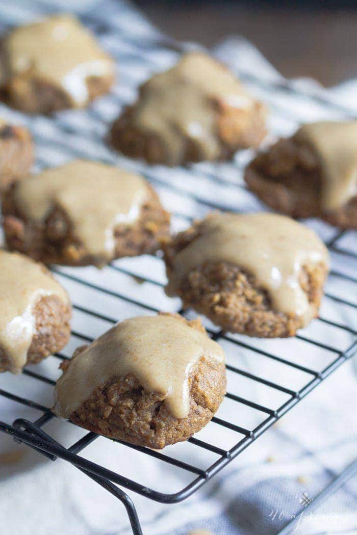 Pumpkin cookies with a maple glaze. These are so insanely healthy but so rich and indulgent! Vegan, gluten free, refined sugar free. They're basically rehab for your seasonal indulgences..