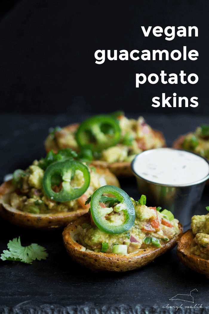 Vegan guacamole potato skins. Crispy potato skins topped with an incredibly flavorful, slightly smoky guacamole. Perfect for tailgating!