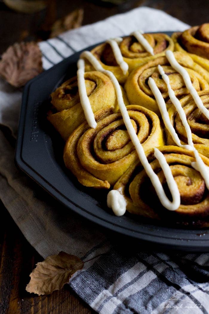 Vegan pumpkin cinnamon rolls with a maple-cream cheese glaze - simplified and ready in about 2 hours, these are the perfect fall breakfast