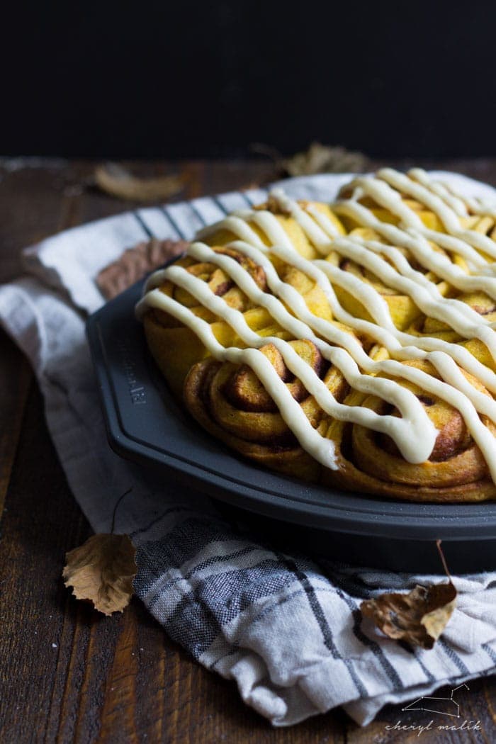 Vegan pumpkin cinnamon rolls with a maple-cream cheese glaze - simplified and ready in about 2 hours, these are the perfect fall breakfast