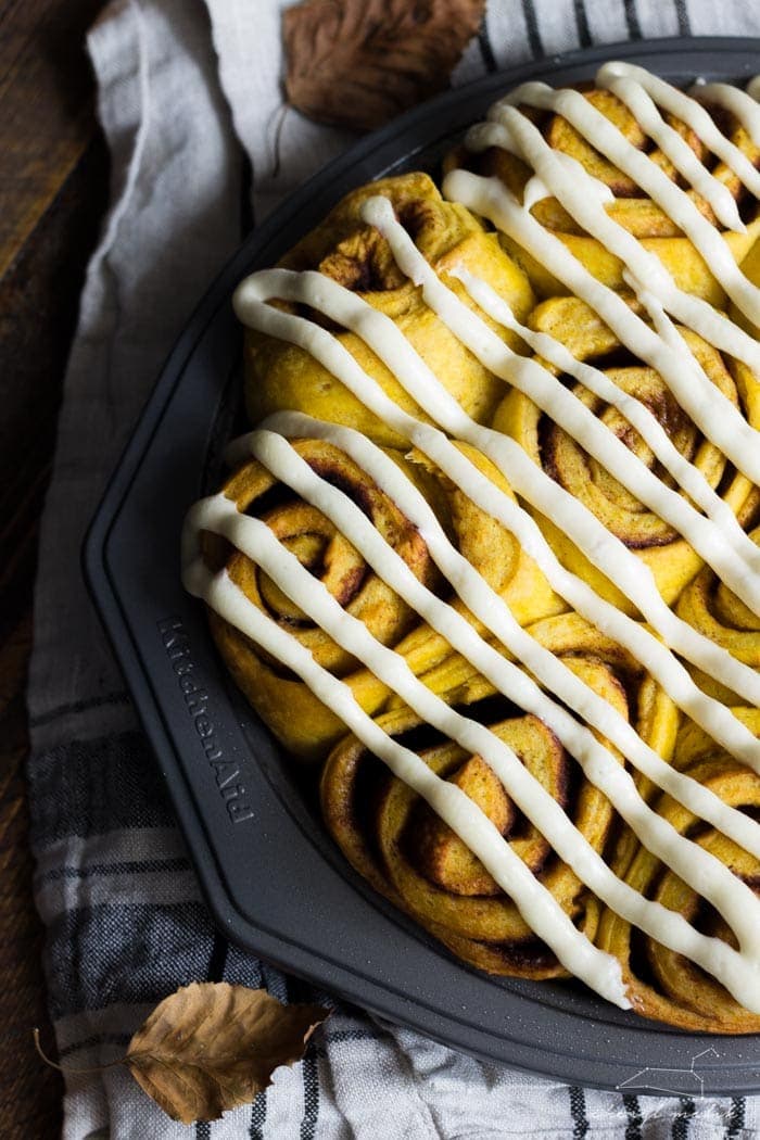 Vegan pumpkin cinnamon rolls with a maple-cream cheese glaze - simplified and ready in about 2 hours, these are the perfect fall breakfast