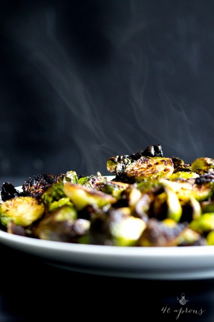 Crispy miso roasted brussel sprouts - in a miso, white wine, and butter sauce, these brussel sprouts are crazy good and so simple! Perfect for Thanksgiving