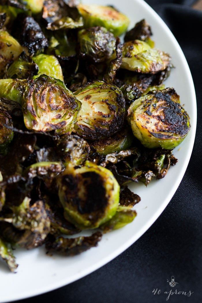 Crispy miso roasted brussel sprouts - in a miso, white wine, and butter sauce, these brussel sprouts are crazy good and so simple! Perfect for Thanksgiving