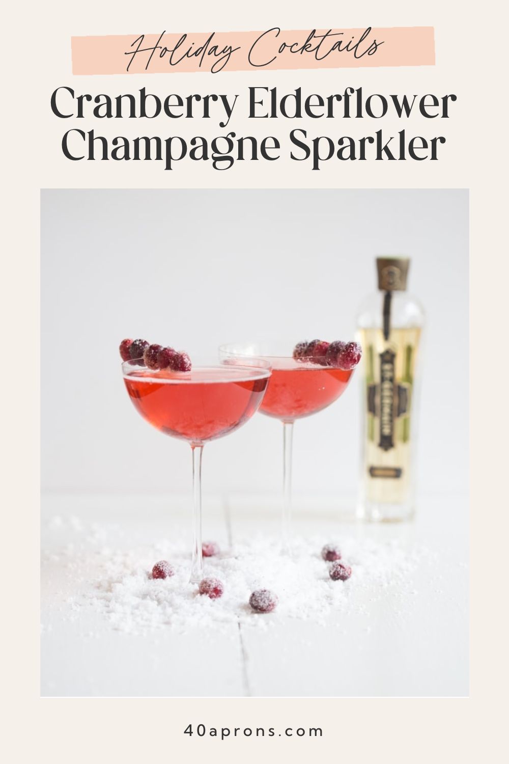 Holiday cranberry elderflower champagne sparkler cocktail recipe pin with St. Germain bottle and coupe glasses.