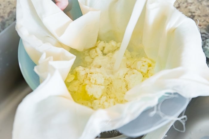 Curds under running water