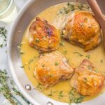 Perfect pan seared chicken thighs with pan sauce in a skillet
