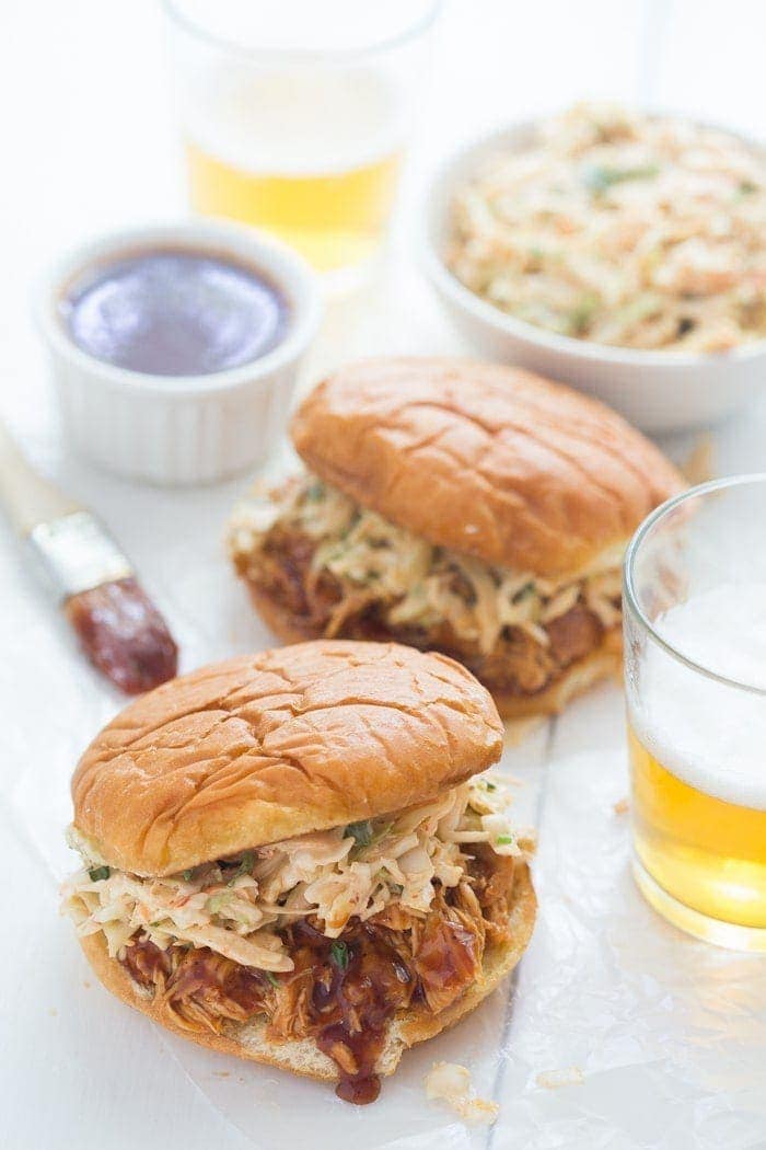 Crockpot BBQ Chicken Sandwiches - easy and perfectly tender, flavorful, and smoky, these are new standbys in our meal plan! // 40 Aprons