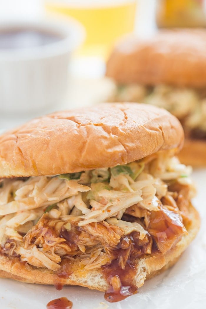 Crockpot BBQ Chicken Sandwiches - easy and perfectly tender, flavorful, and smoky, these are new standbys in our meal plan! // 40 Aprons