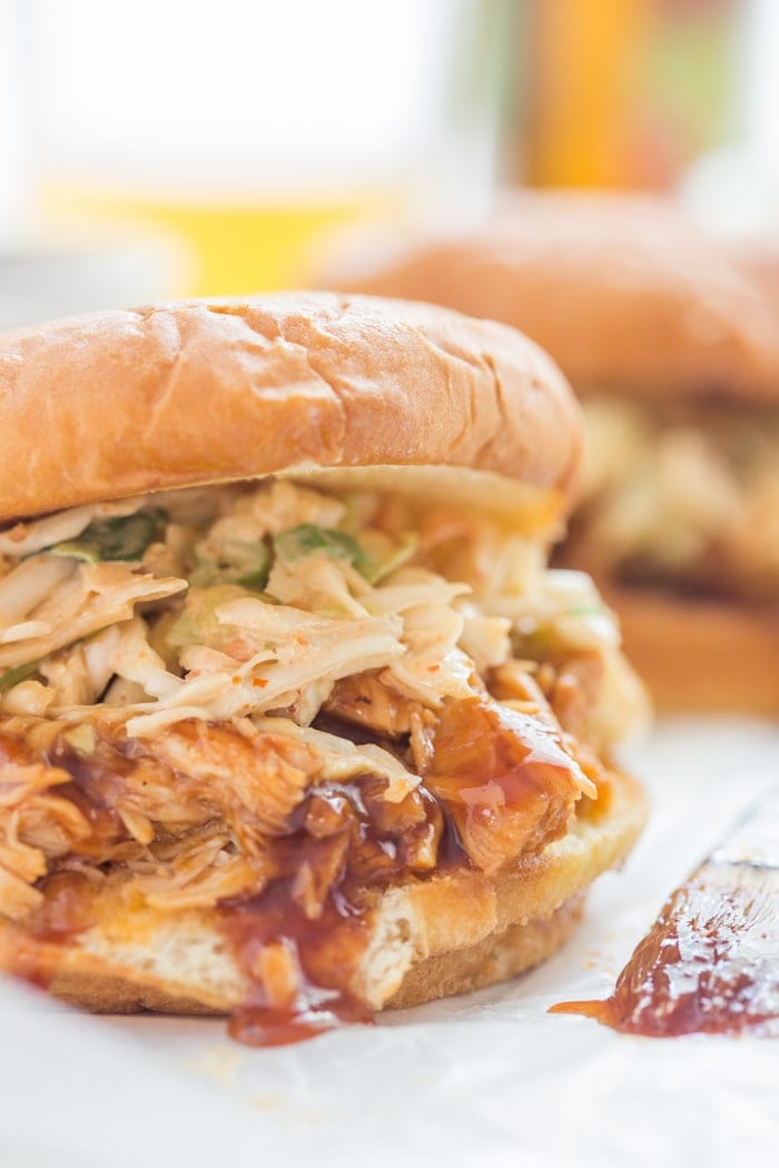 Crockpot BBQ Chicken Sandwiches - easy and perfectly tender, flavorful, and smoky, these are new standbys in our meal plan! // 40 Aprons