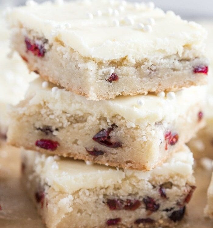 Oh so easy cranberry white chocolate cookie bars. Perfect for the holidays! // 40 Aprons