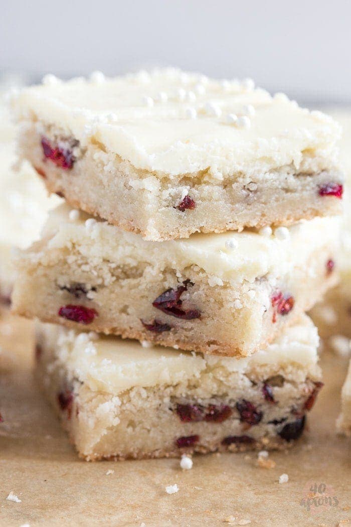 Oh so easy cranberry white chocolate cookie bars. Perfect for the holidays! // 40 Aprons