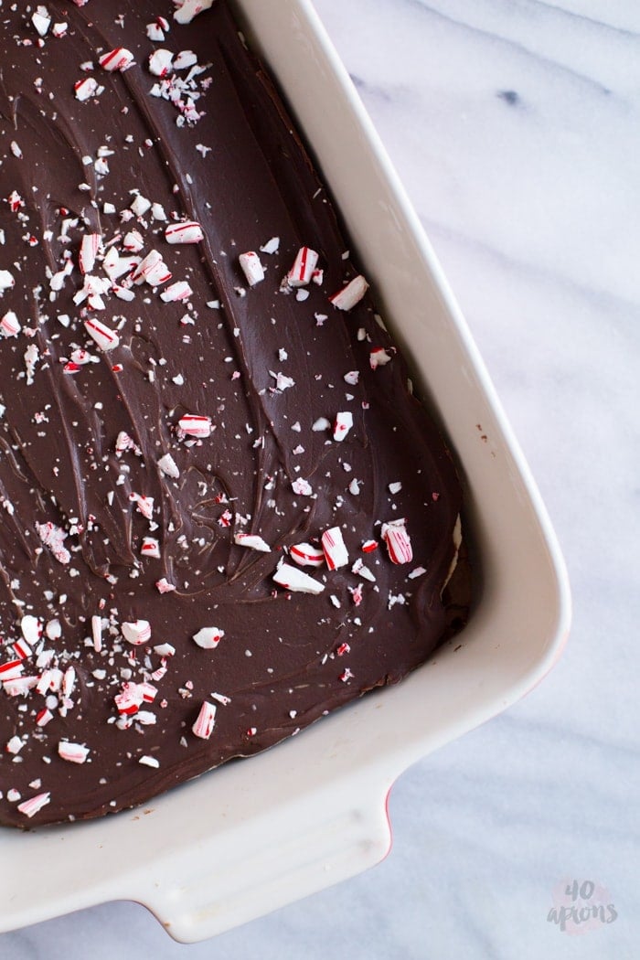 Peppermint layer brownies. Unbelievable peppermint chocolate layered brownies: tender brownie, creamy cool frosting, and rich pepperminty ganache. Oh. My. Heavens. // 40 Aprons