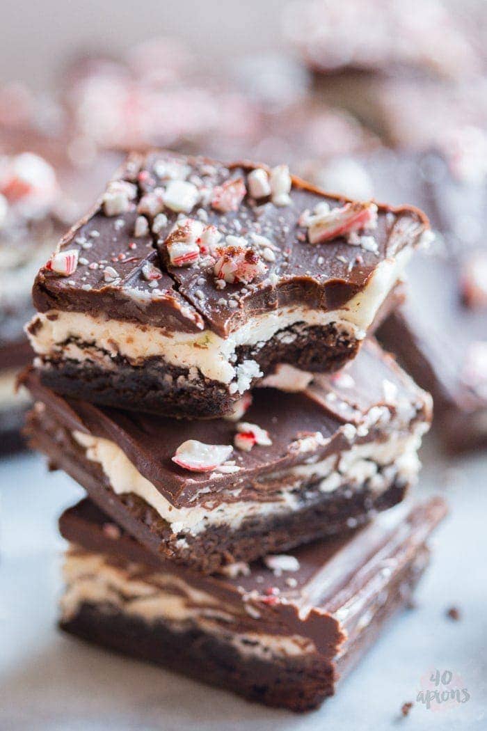 Peppermint layer brownies. Unbelievable peppermint chocolate layered brownies: tender brownie, creamy cool frosting, and rich pepperminty ganache. Oh. My. Heavens. // 40 Aprons