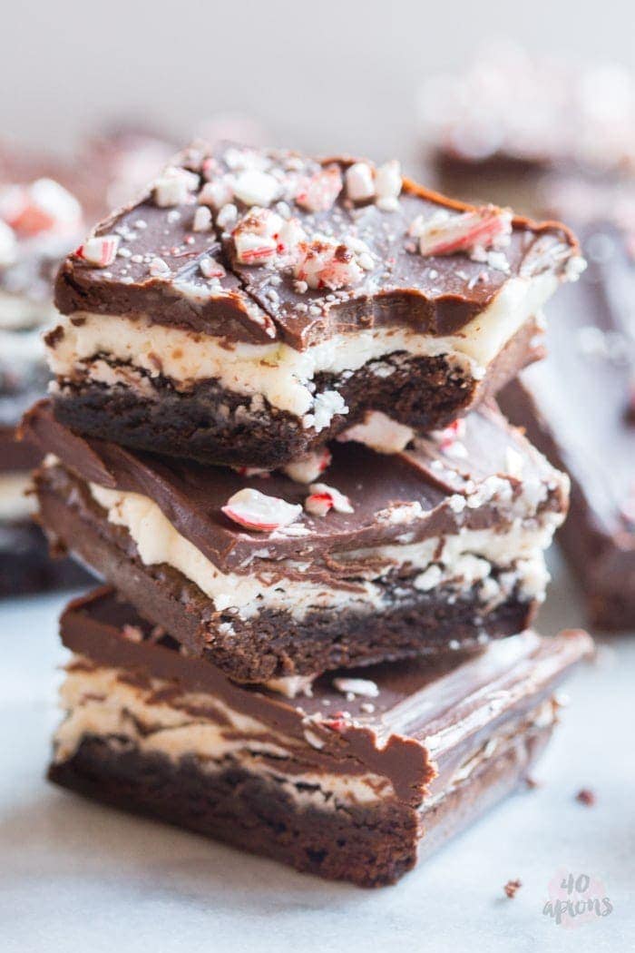 Peppermint layer brownies. Unbelievable peppermint chocolate layered brownies: tender brownie, creamy cool frosting, and rich pepperminty ganache. Oh. My. Heavens. // 40 Aprons