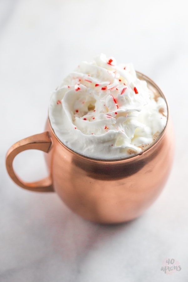 Spiked peppermint hot chocolate. So rich and creamy with the perfect peppermint kick.. truly a merry Christmas! // 40 Aprons