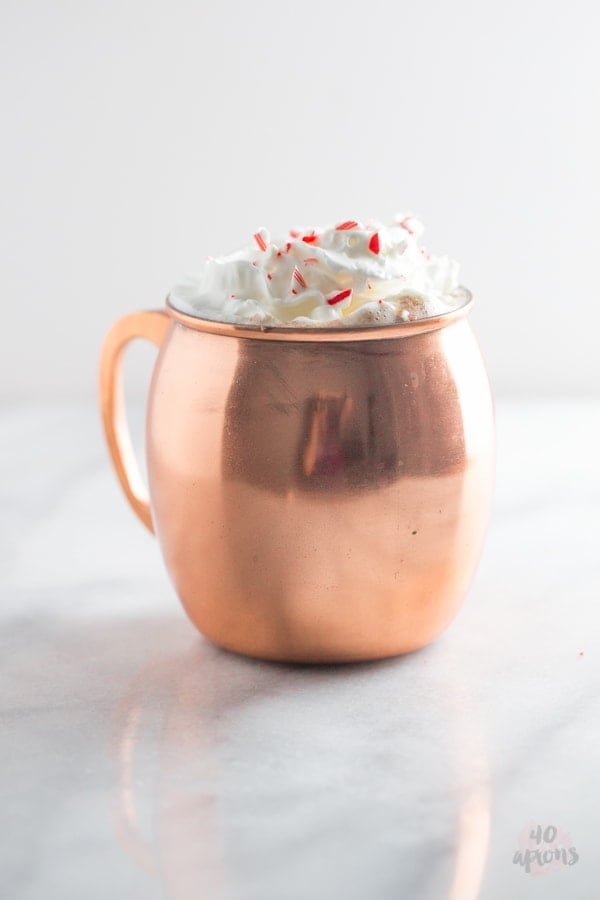 Spiked peppermint hot chocolate. So rich and creamy with the perfect peppermint kick.. truly a merry Christmas! // 40 Aprons