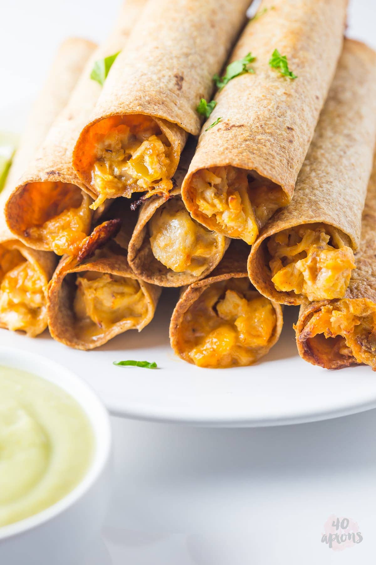 Cheesy chicken taquitos with avocado salsa (whole wheat!) // 40 Aprons