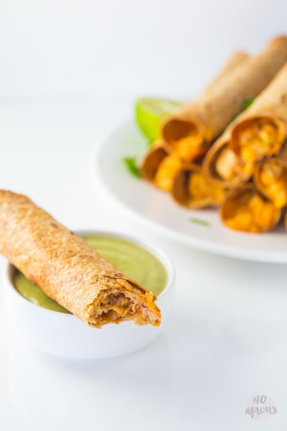 Cheesy chicken taquitos with avocado salsa (whole wheat!) // 40 Aprons