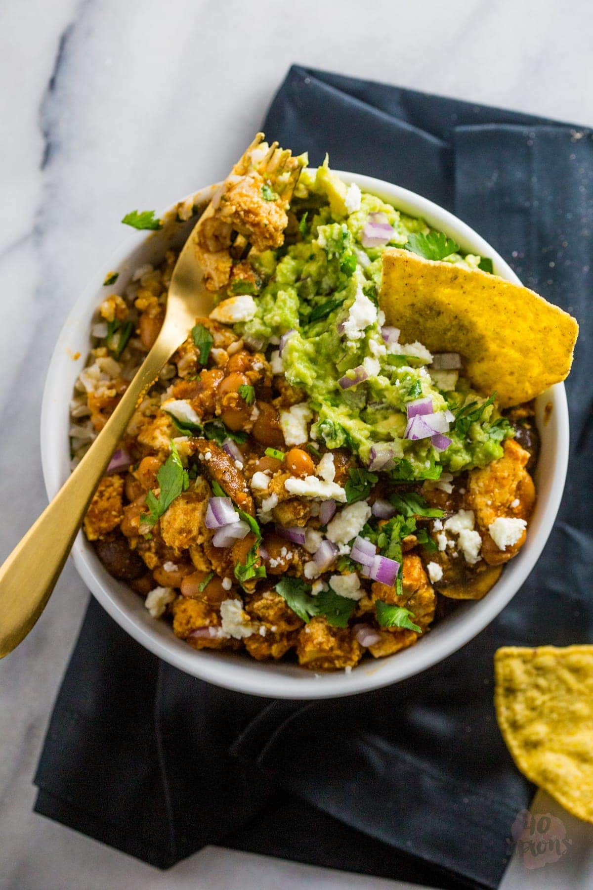 Tofu sofritas bowl - spicy, smoky, and totally vegetarian (and vegan!). You won't miss the meat. at. all. Tofu for tofu haters! // 40 Aprons