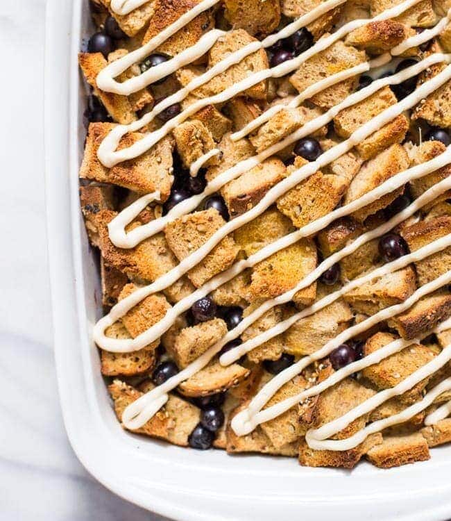 Healthy Overnight French Toast Casserole with Blueberries and Maple-Cream Cheese Glaze