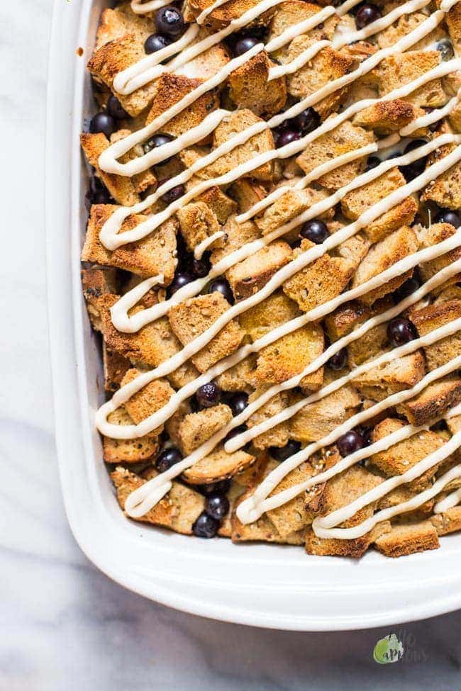 Healthy Overnight French Toast Casserole with Blueberries and Maple-Cream Cheese Glaze