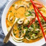 This paleo coconut curry zoodle soup is quick and delicious, loaded with creamy coconut milk, intensely flavorful red curry paste, and zoodles. This recipe is a wonderful paleo dinner or paleo soup recipe to add to your collection. Low carb yet filling, you can make this paleo coconut curry zoodle soup a vegan coconut curry zoodle soup with an easy swap!