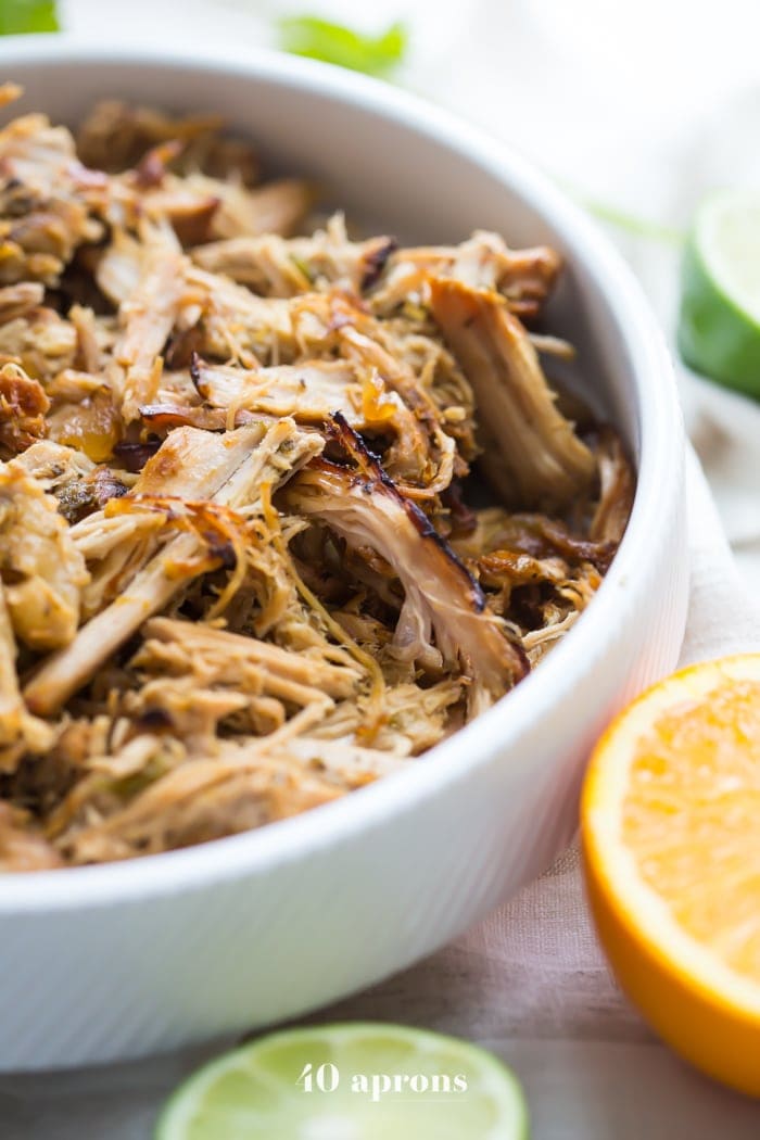 Paleo carnitas made from pork tenderloin in the Crockpot. These paleo carnitas are made with pork tenderloin in the Crockpot for a super easy Whole30 dinner. Pork tenderloin makes these paleo carnitas super budget-friendly, and they're full of flavor, making them perfect for a Chipotle copycat Whole30 carnitas bowl like you'd get at Chipotle!