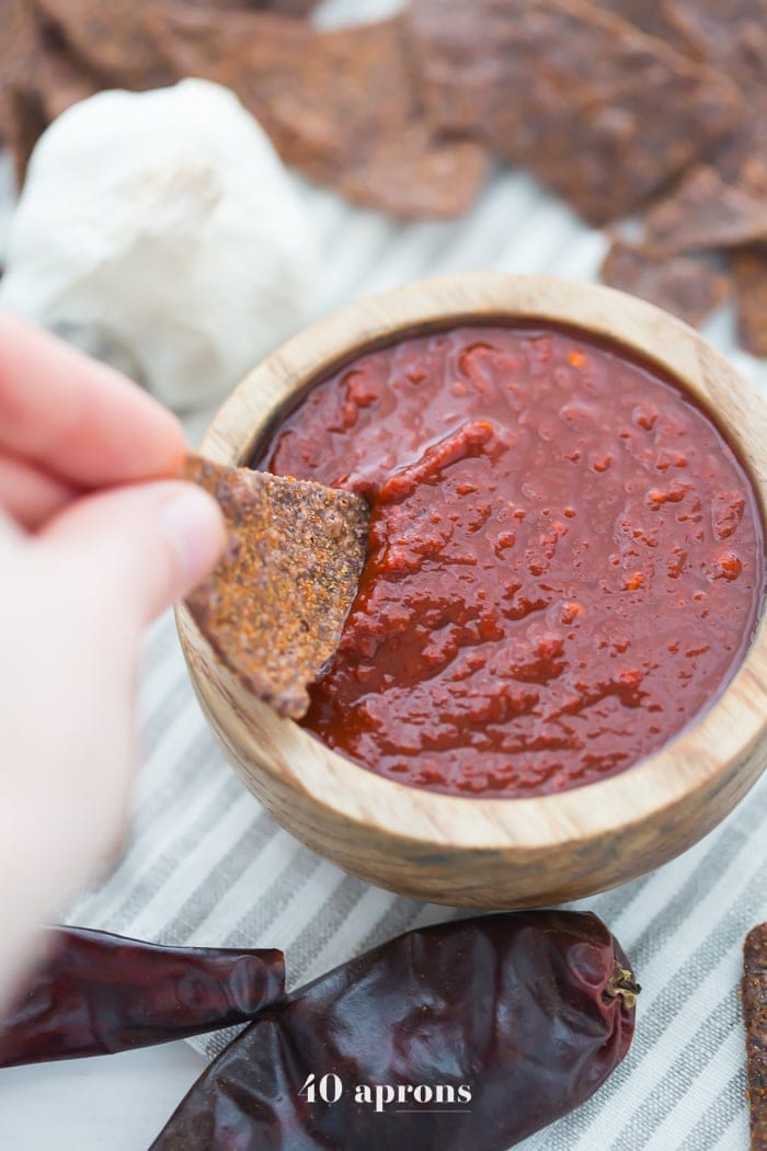 This smoky guajillo salsa recipe is deep and flavorful, full of toasted, dried guajillo chiles, garlic, and fresh tomatoes. It's the perfect smoky salsa recipe to keep in the fridge (at all times, pretty sure) so you can put it on all the things. Inspired by my favorite local taqueria salsa, you'll love this smoky salsa recipe, especially during warmer weather! Buy dried guajillo chiles here.