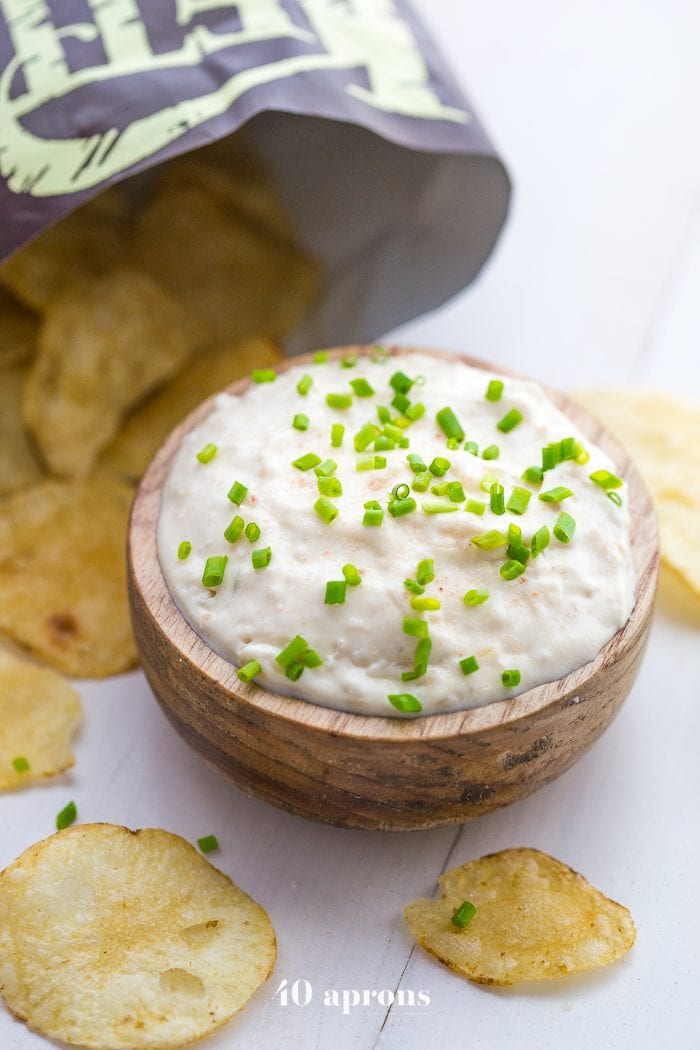 This paleo French onion dip is easy, delicious, and perfect with potato chips for a paleo appetizer. This Paleo French onion dip is absolutely bound to become one of your favorite paleo dips and it's just in time for summer!