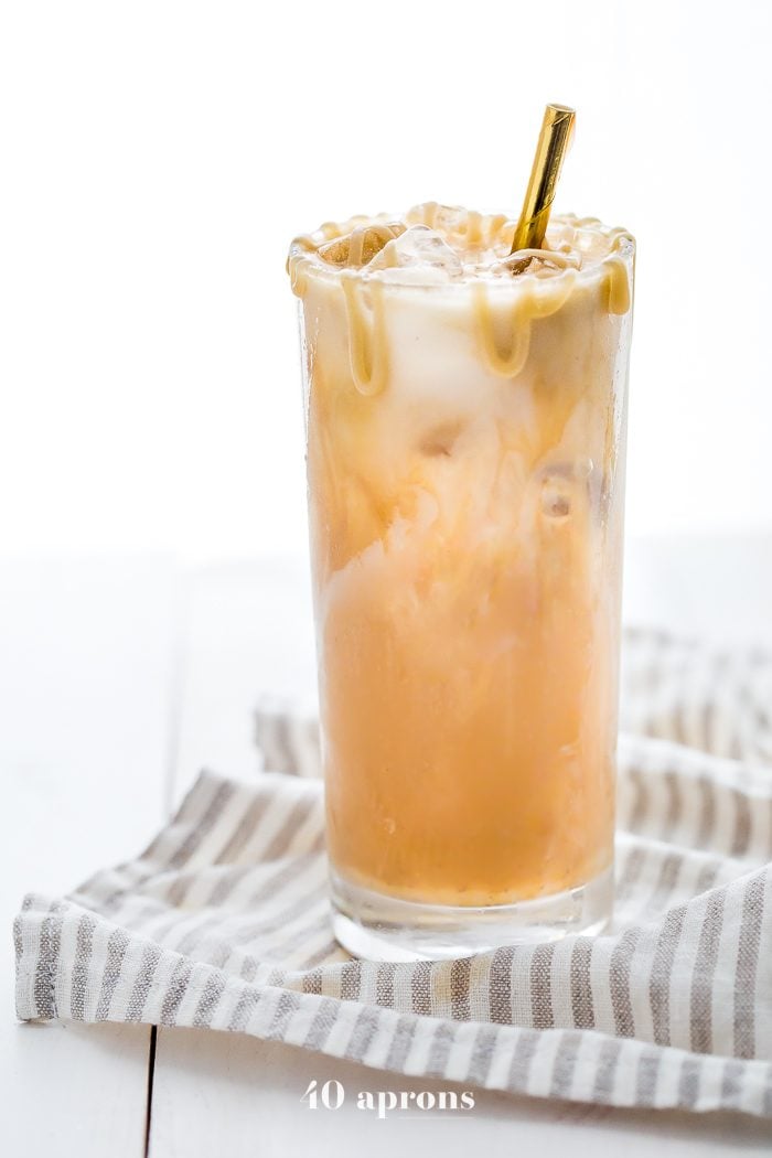 This paleo iced caramel macchiato is so rich and refreshing without any dairy or refined sugar! Using cold brew for a smooth taste means this paleo iced caramel macchiato is easy to make at home. The perfect vegan iced caramel macchiato for all summer long!