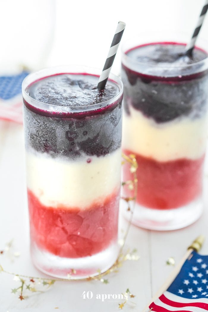 These paleo red, white, and blue cocktails are perfect 4th of July cocktails: boozy, fruity layers form a striking drink that tastes delish. Easy to make and free of refined sugar and dairy, these are the perfect Memorial Day cocktails, Labor Day cocktails, or heck, just paleo summer cocktails, too. U-S-A!