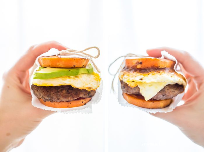 These Whole30 breakfast sandwiches are easy to make and insanely good. Buttery sweet potato buns layered with Whole30 breakfast sausage, fried egg, and avocado or quick Whole30 chipotle aioli, they're about to be your favorite Whole30 breakfast.