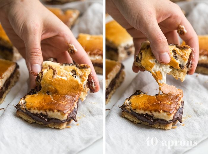 These paleo smores bars are the perfect paleo dessert this summer. A graham cracker crust, topped with chocolate and a burnt marshmallow layer, they're inspired by the classic summer treat but are grain-free, dairy-free, and refined-sugar-free. These paleo smores bars are great for entertaining!