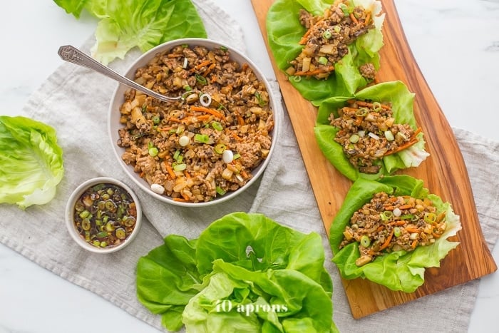 These Whole30 lettuce wraps are the best PF Changs lettuce wraps recipe. Loaded with flavor and with lots of veggies, these Whole30 lettuce wraps are a great Whole30 dinner recipe. You'll love these paleo lettuce wraps because they're filling yet light, totally healthy, and slightly sweet yet nutty and spicy. So good! My favorite PF Changs lettuce wraps recipe, for sure.