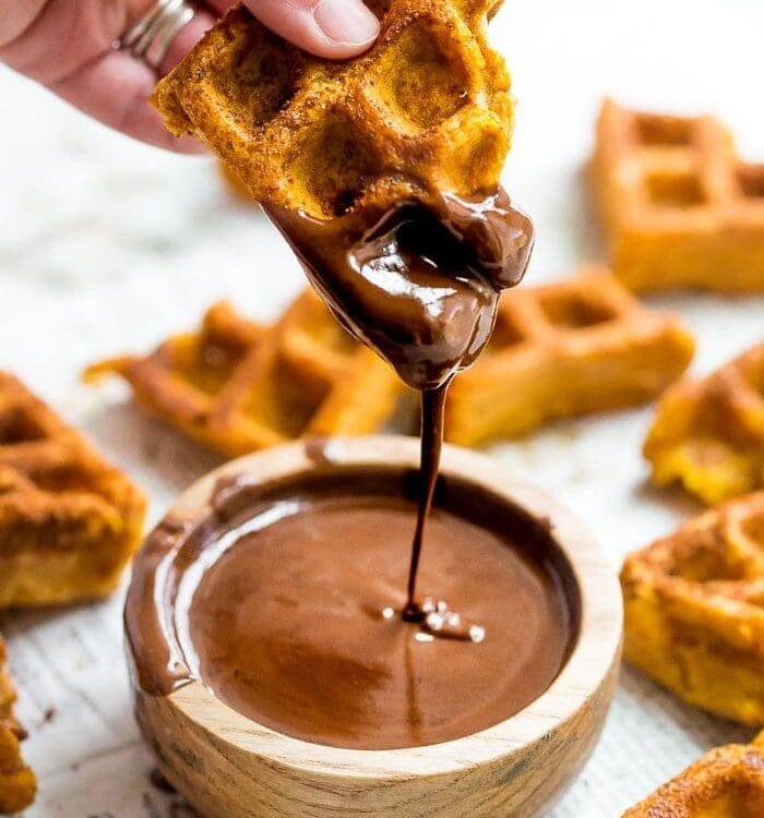 These paleo pumpkin churros with dark chocolate sauce are heavenly: loaded with fall flavor, crispy on the outside, tender on the inside, and made in the waffle iron! They're such a perfect paleo fall recipe because they're totally delicious but there's no frying necessary. These paleo pumpkin churros with dark chocolate sauce are a must make when it comes to paleo fall recipes!