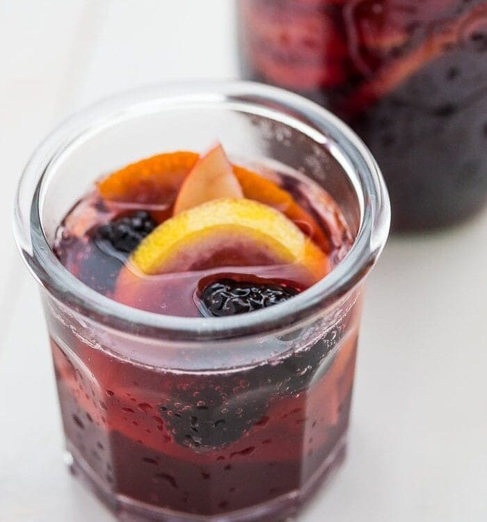This paleo sangria is just like an authentic Spanish-style sangira but made with healthier ingredients. It's sweet, strong, and delicious, just like a paleo sangria should be! You'll love this paleo sangria because it's so easy to make ahead and only takes a few minutes to prepare, but it'll become an absolute favorite with your friends. But be warned: this paleo sangria can be strong!