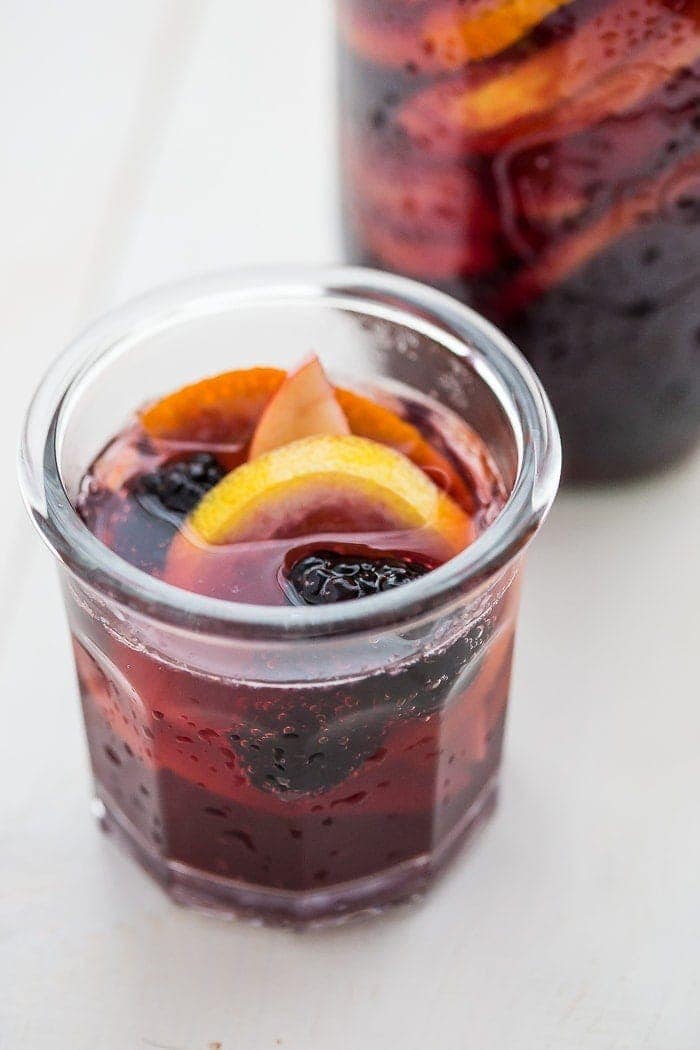 This paleo sangria is just like an authentic Spanish-style sangira but made with healthier ingredients. It's sweet, strong, and delicious, just like a paleo sangria should be! You'll love this paleo sangria because it's so easy to make ahead and only takes a few minutes to prepare, but it'll become an absolute favorite with your friends. But be warned: this paleo sangria can be strong!