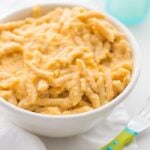 This quick hidden veggie mac and cheese comes together in only 5 minutes and gets its creaminess from veggies! The perfect toddler mac and cheese, this quick hidden veggie mac and cheese is healthier and way better than boxed! Made with frozen cauliflower rice and carrots, Barilla Ready Pasta, and a bit of cheddar cheese, this quick hidden veggie mac and cheese will become a staple in yours kids' diets.