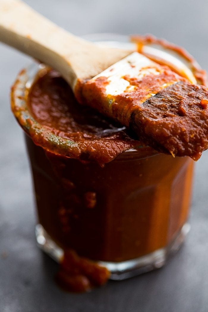 This Whole30 BBQ sauce is a delicious Whole30 condiment. Perfect on ribs, pulled pork, or chicken, this Whole30 BBQ sauce is spiced with chipotle powder and lightly sweetened with coconut aminos. A jar of this Whole30 BBQ sauce in the fridge will mean plenty of simple, flavorful Whole30 dinners!