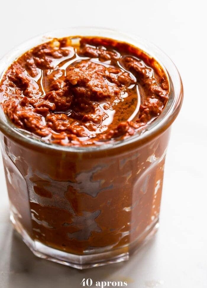 Want to learn how to make harissa? This harissa recipe is spicy, smoky, and garlicky, and it tastes so, so good on pretty much everything. With only a few ingredients, learning how to make harissa is a cinch! Make sure you check out my how to make harissa video, too